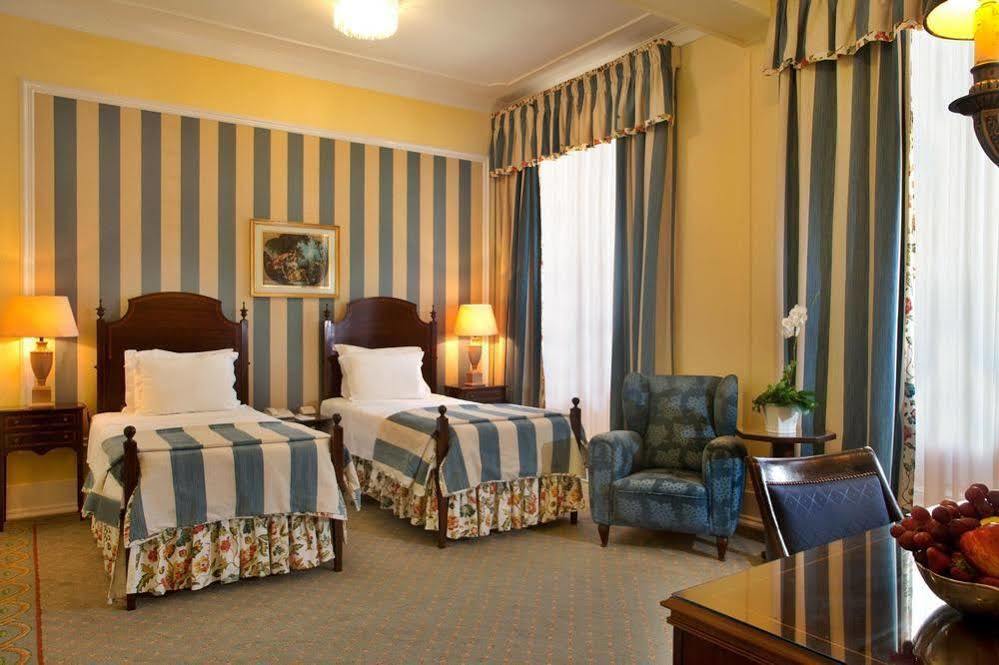 Hotel Avenida Palace Lisboa Eksteriør bilde A room at the hotel
